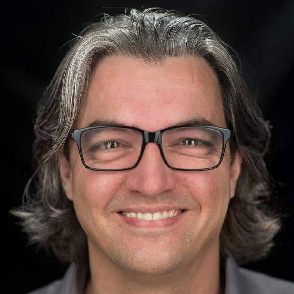 Gerbrand Grijs – Gerbrand van Kolck a man wearing glasses and smiling at the camera