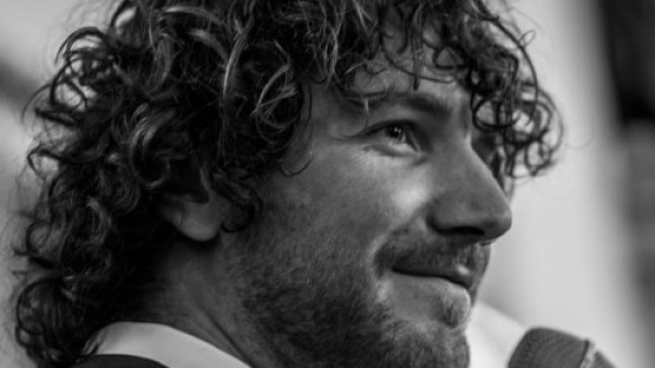 Jesse Brouwer a man wearing a suit and tie