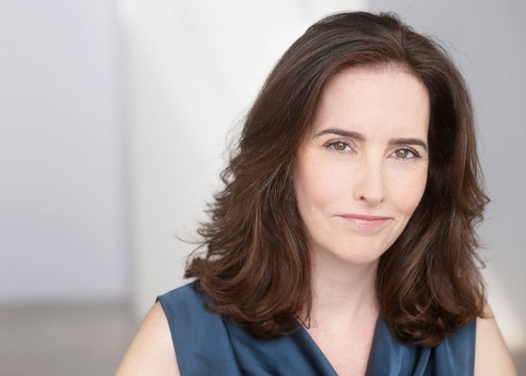 a woman in a blue shirt