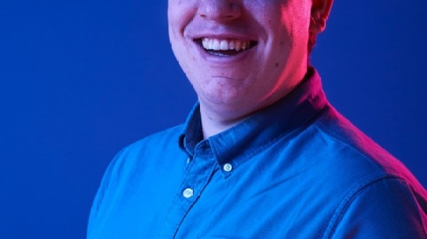 rhys a man wearing a blue shirt